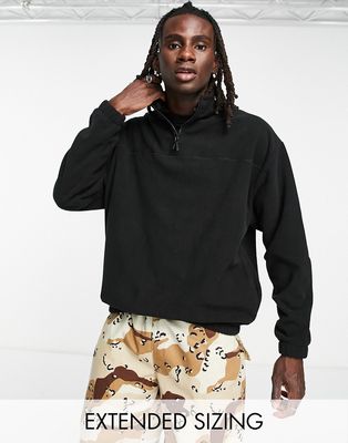 ASOS DESIGN oversized half zip sweatshirt in black polar fleece