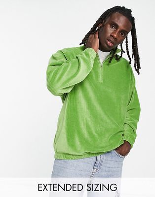 ASOS DESIGN oversized half zip sweatshirt in green ribbed velour