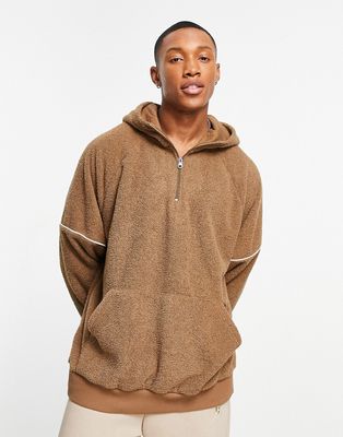 ASOS DESIGN oversized hoodie in brown terry with panel detail