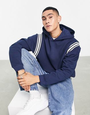 ASOS DESIGN oversized hoodie in navy with insert panels