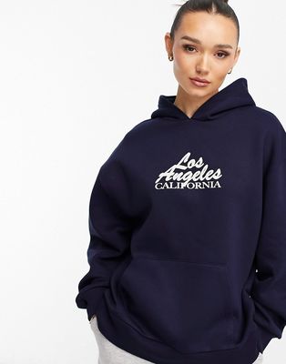 ASOS DESIGN oversized hoodie with LA graphic in navy