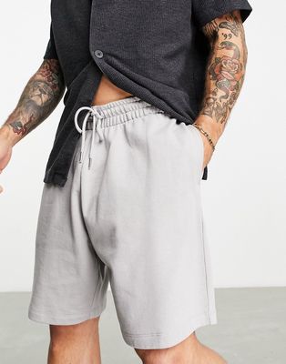 ASOS DESIGN oversized jersey mid length shorts in gray