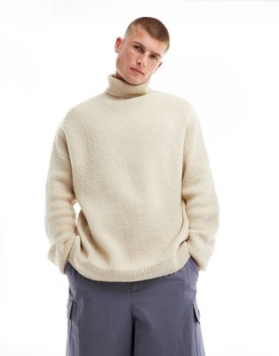 ASOS DESIGN oversized knit fluffy turtleneck sweater in beige-Neutral