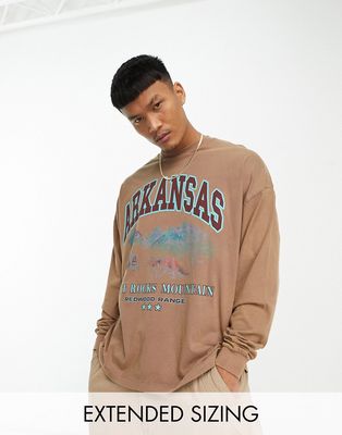 ASOS DESIGN oversized long sleeve t-shirt in washed brown with retro city chest print