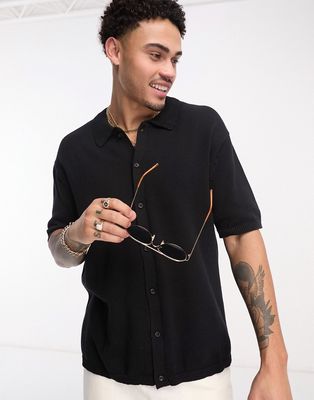 ASOS DESIGN oversized midweight knit cotton button up polo in black