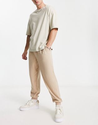 ASOS DESIGN oversized sweatpants in beige brushed rib texture-Neutral