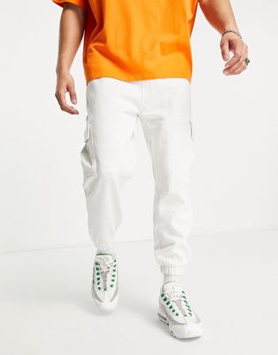 ASOS DESIGN oversized sweatpants with cargo pockets in white marl
