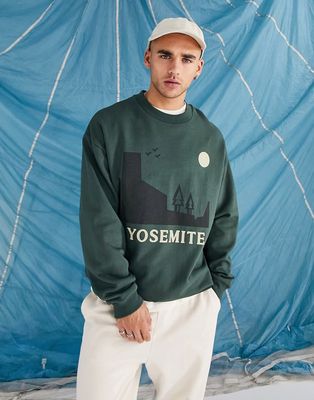 ASOS DESIGN oversized sweatshirt in khaki with Yosemite front print-Green