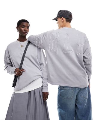 ASOS DESIGN oversized sweatshirt in washed gray with large scale embroidery