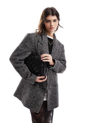 ASOS DESIGN oversized tailored jacket in black herringbone in black
