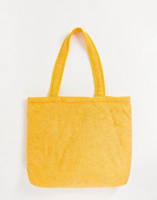 ASOS DESIGN oversized tote bag in orange towelling