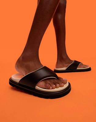 ASOS DESIGN padded flip flops in black with contrast cream lining