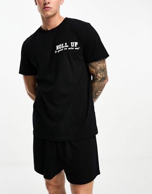 ASOS DESIGN pajama set in black with t-shirt and shorts with pizza back print