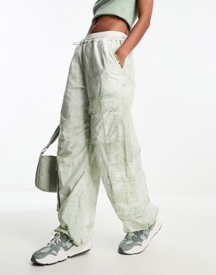 ASOS DESIGN parachute cargo pants with pockets in tie dye-Multi