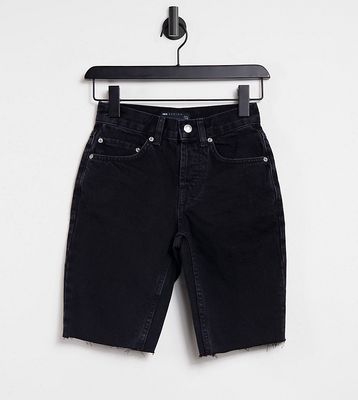 ASOS DESIGN Petite cotton blend denim '90s' longline shorts in washed black - BLACK