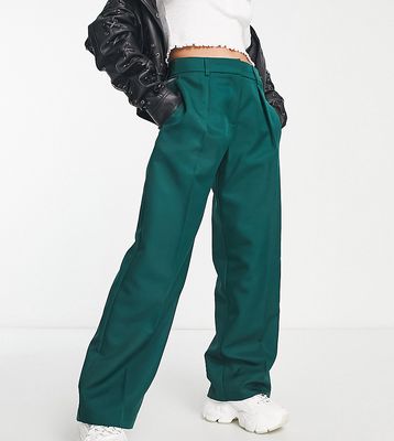 ASOS DESIGN Petite everyday slouchy pants in dark green