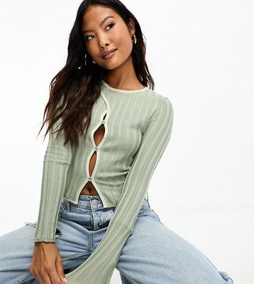 ASOS DESIGN Petite knitted top with cut out detail and contrast tipping in green