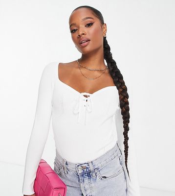ASOS DESIGN Petite knitted top with sweetheart neck and lace up front detail in white