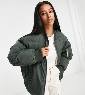 ASOS DESIGN Petite reversible quilted bomber jacket in khaki and cream-Green
