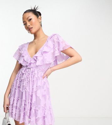 ASOS DESIGN Petite v front ruffle mini dress with flutter sleeves and tie belt in textured jacquard in lilac-Purple