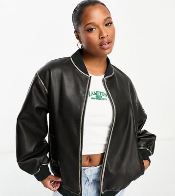 ASOS DESIGN Petite washed faux leather bomber in black