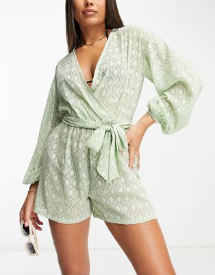 ASOS DESIGN plunge beach romper in floaty sheer jacquard in sage-Pink