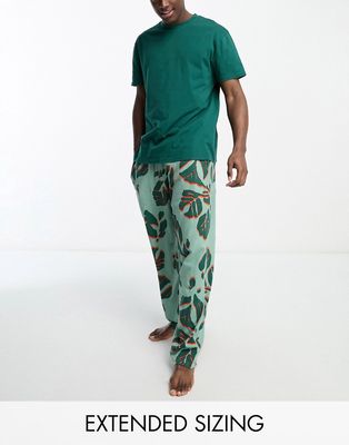ASOS DESIGN pyjama lounge set with T-shirt and pants in green with leaf print