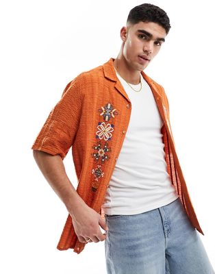 ASOS DESIGN relaxed camp collar shirt in rust with front cross stitch embroidery-Orange