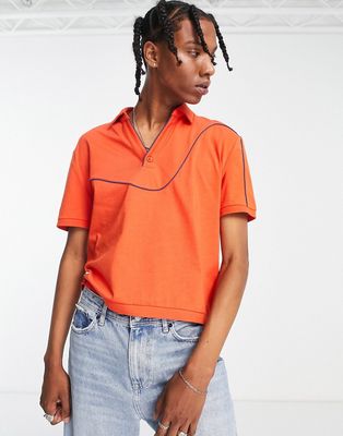 ASOS DESIGN relaxed polo in red with contrast piping