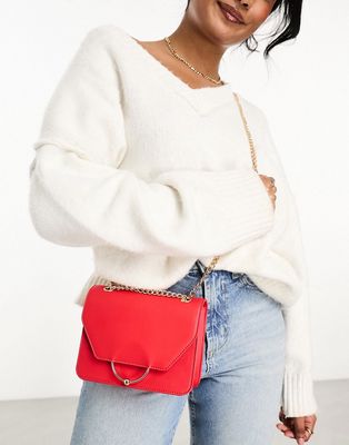 ASOS DESIGN ring and ball shoulder bag with interchangeable chain strap in red