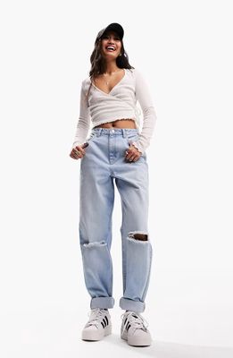 ASOS DESIGN Ripped Relaxed Mom Jeans in Light Blue