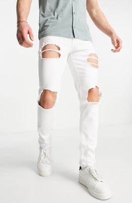 ASOS DESIGN Ripped Skinny Jeans in White