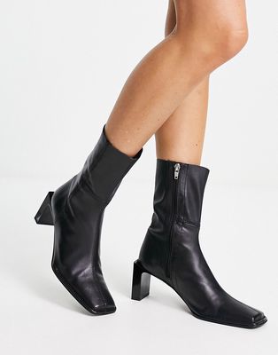ASOS DESIGN Roman premium leather heeled sock boots in black