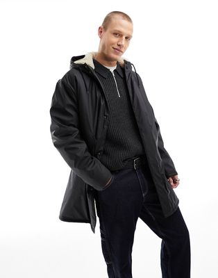 ASOS DESIGN rubberized rain jacket with borg lining in black