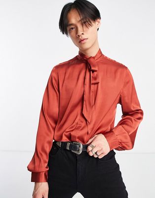 ASOS DESIGN satin shirt with tie neck and blouson volume sleeve in polyester in brick red