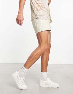 ASOS DESIGN skinny chino shorts in beige in extreme shorter length-Neutral