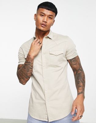 ASOS DESIGN skinny denim shirt with western detail in stone-Neutral