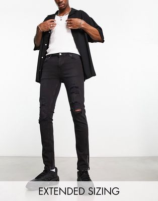 ASOS DESIGN skinny jeans in black with knee rips and zip detail