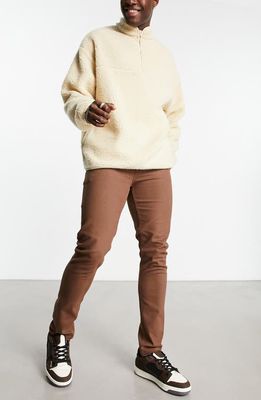 ASOS DESIGN skinny jeans in brown