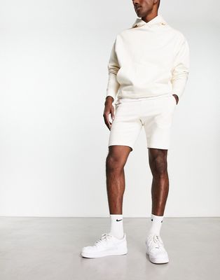 ASOS DESIGN skinny jersey shorts in soft white