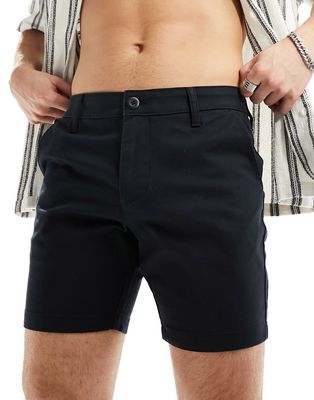 ASOS DESIGN skinny mid length chino shorts in black