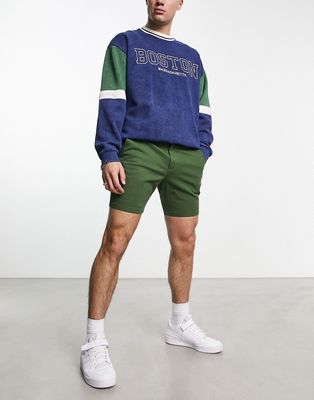 ASOS DESIGN skinny shorts in mid length in khaki-Green