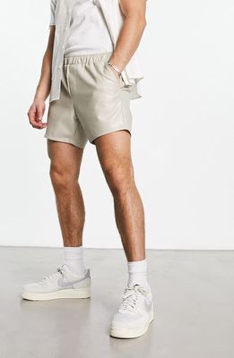 ASOS DESIGN Slim Fit Faux Leather Pull-On Shorts in Beige