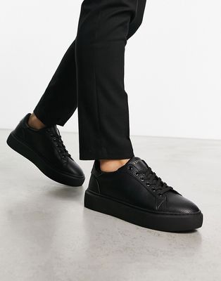 ASOS DESIGN smart chunky lace up sneakers in black faux leather with black sole