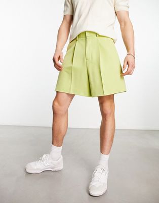 ASOS DESIGN smart cropped bermuda shorts in green