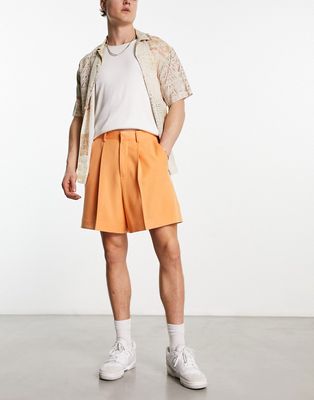ASOS DESIGN smart cropped bermuda shorts in orange