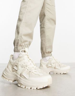 ASOS DESIGN sneakers with multi rubber panels and chunky sole in stone-Neutral