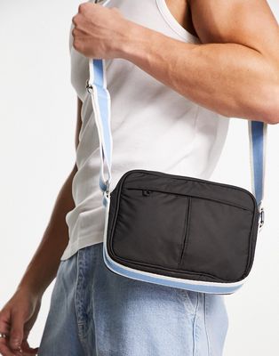ASOS DESIGN soft crossbody bag with stripe webbing in blue and black