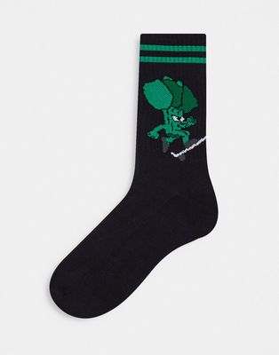 ASOS DESIGN sports socks in black with skateboarding broccoli design