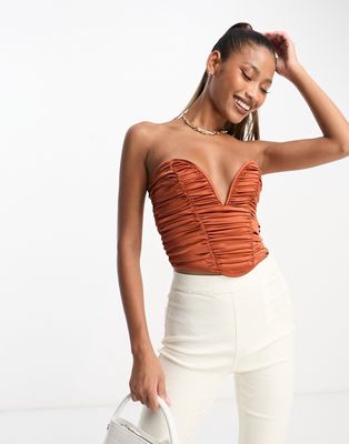 ASOS DESIGN strapless ruched corset top with plunge v in rust-Red
